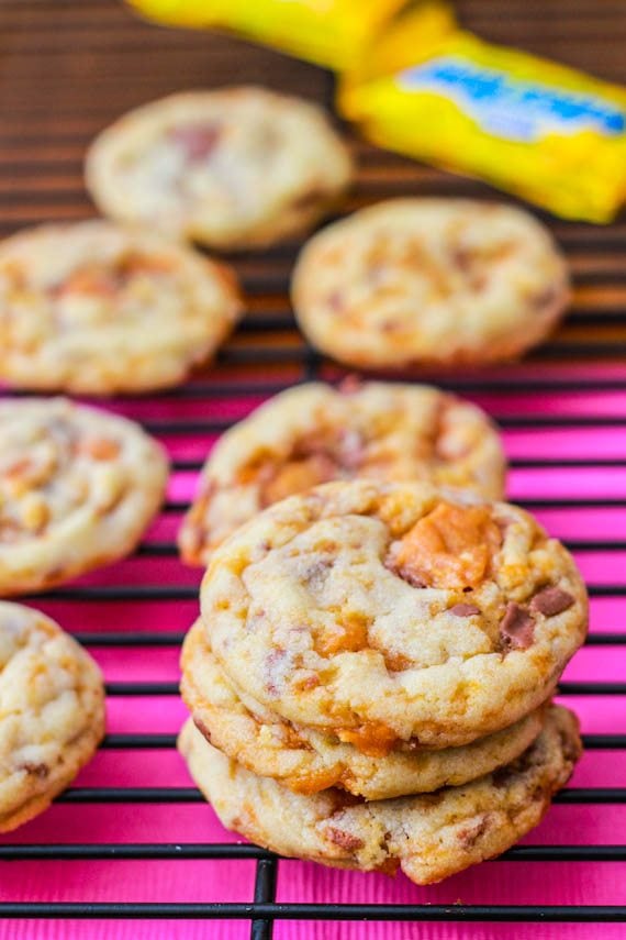 stack of chewy Butterfinger cookies on a cooling rack