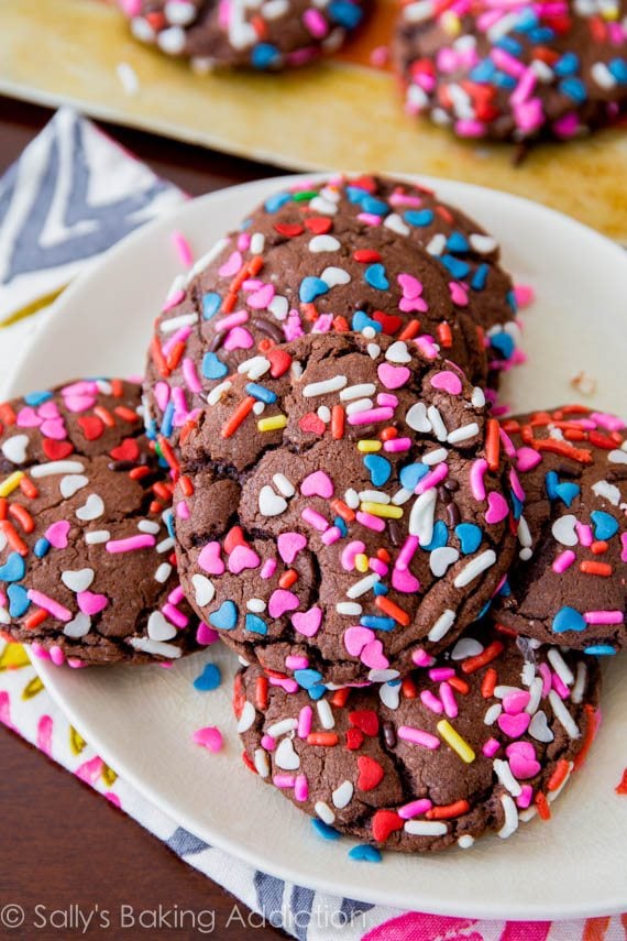 chocolate cake mix cookies with sprinkles on a white plate