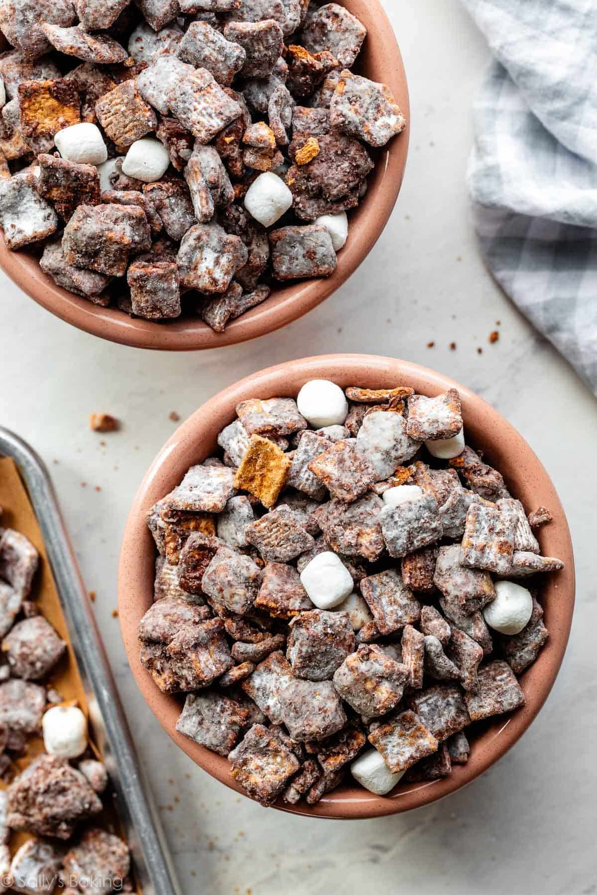 s'mores puppy chow in pink bowls.