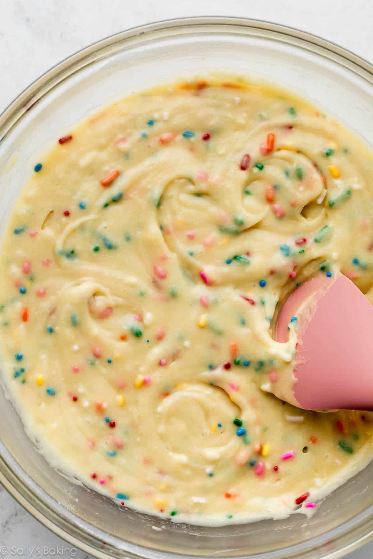 sprinkles in cake batter in bowl.
