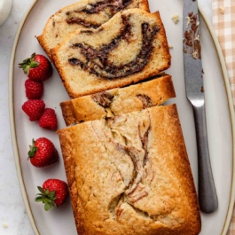 Nutella swirl pound cake with fresh berries.