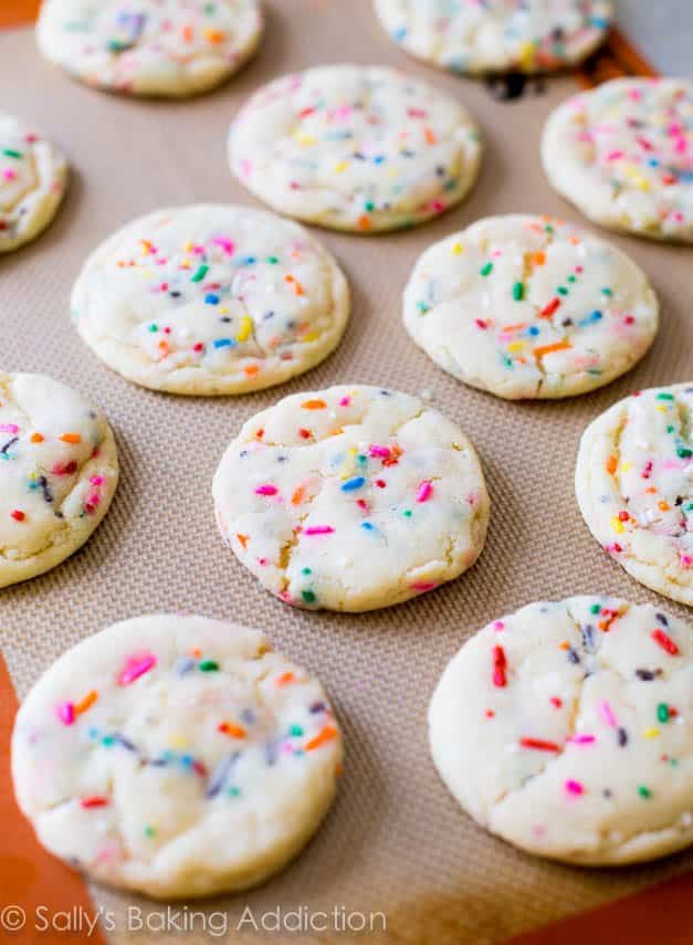 funfetti sugar cookies on a silpat baking mat