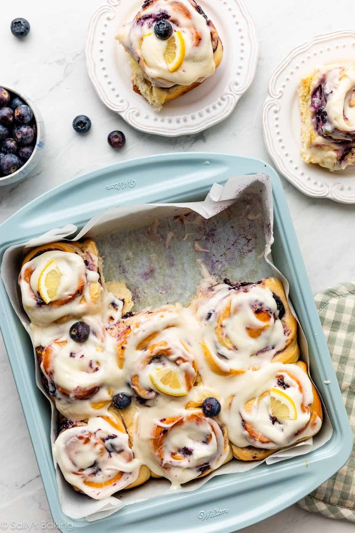 blueberry lemon sweet rolls in square baking pan.