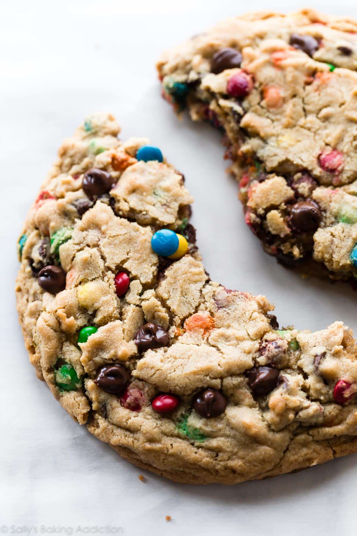 One giant monster cookie split in half