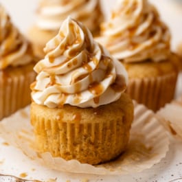 brown sugar cupcake with butterscotch sauce and vanilla buttercream on top.