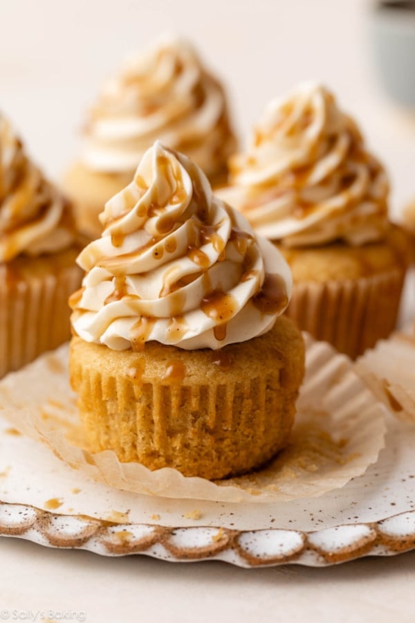 brown sugar cupcake with butterscotch sauce and vanilla buttercream on top.