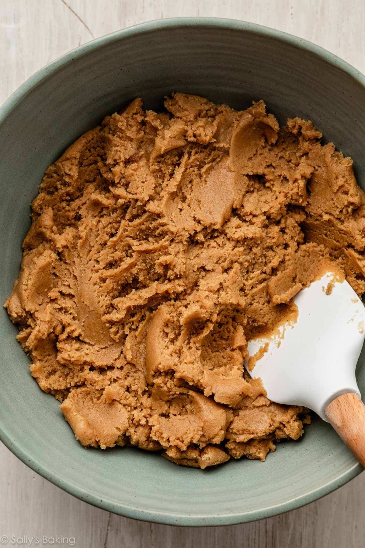 cookie dough in green bowl.