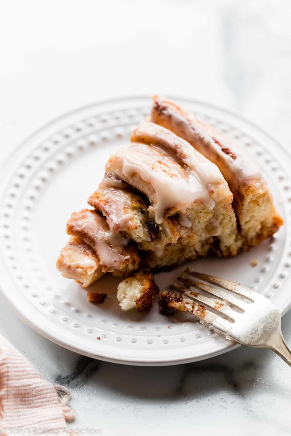 giant cinnamon roll cake slice