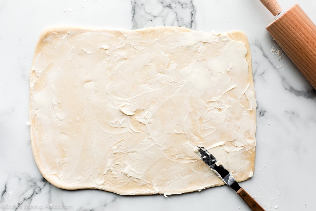 rolled out dough with butter