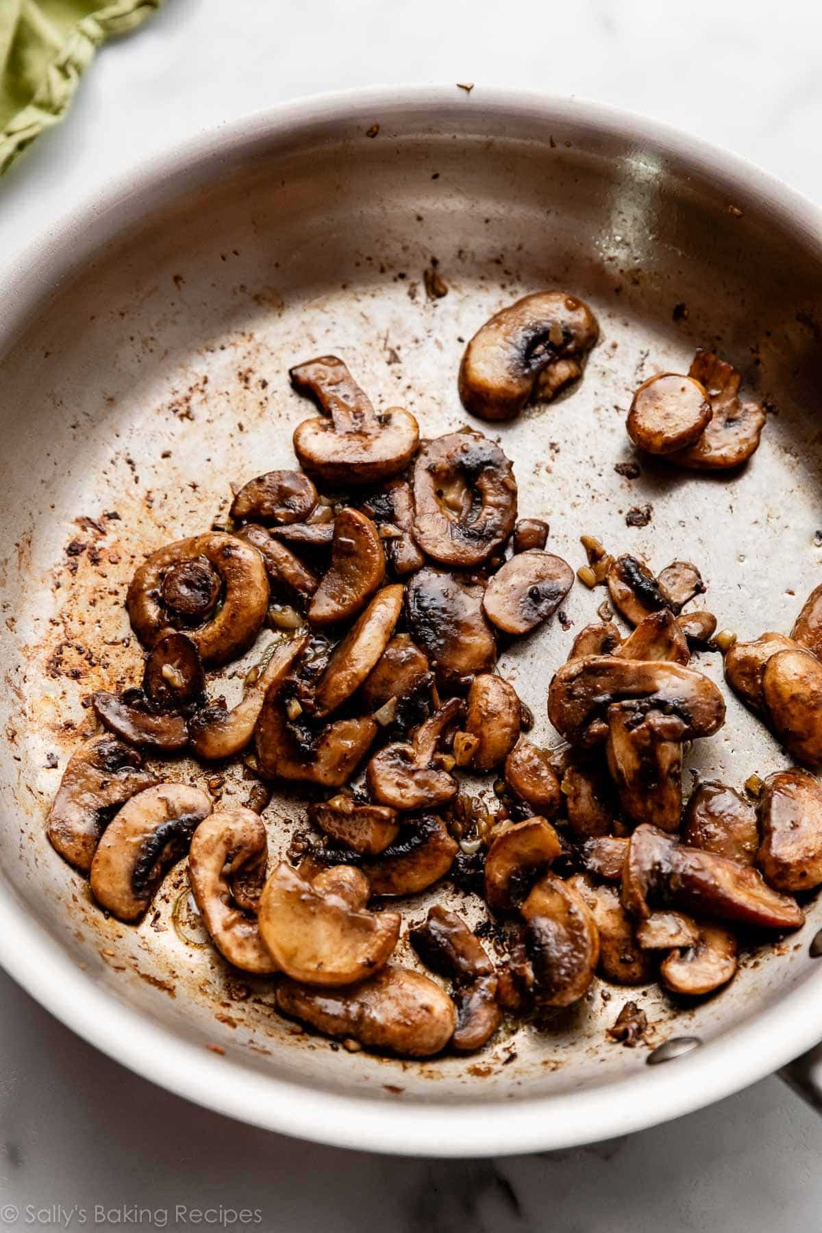 sauteed mushrooms in skillet.