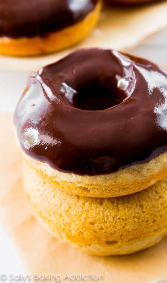 stack of chocolate frosted donuts