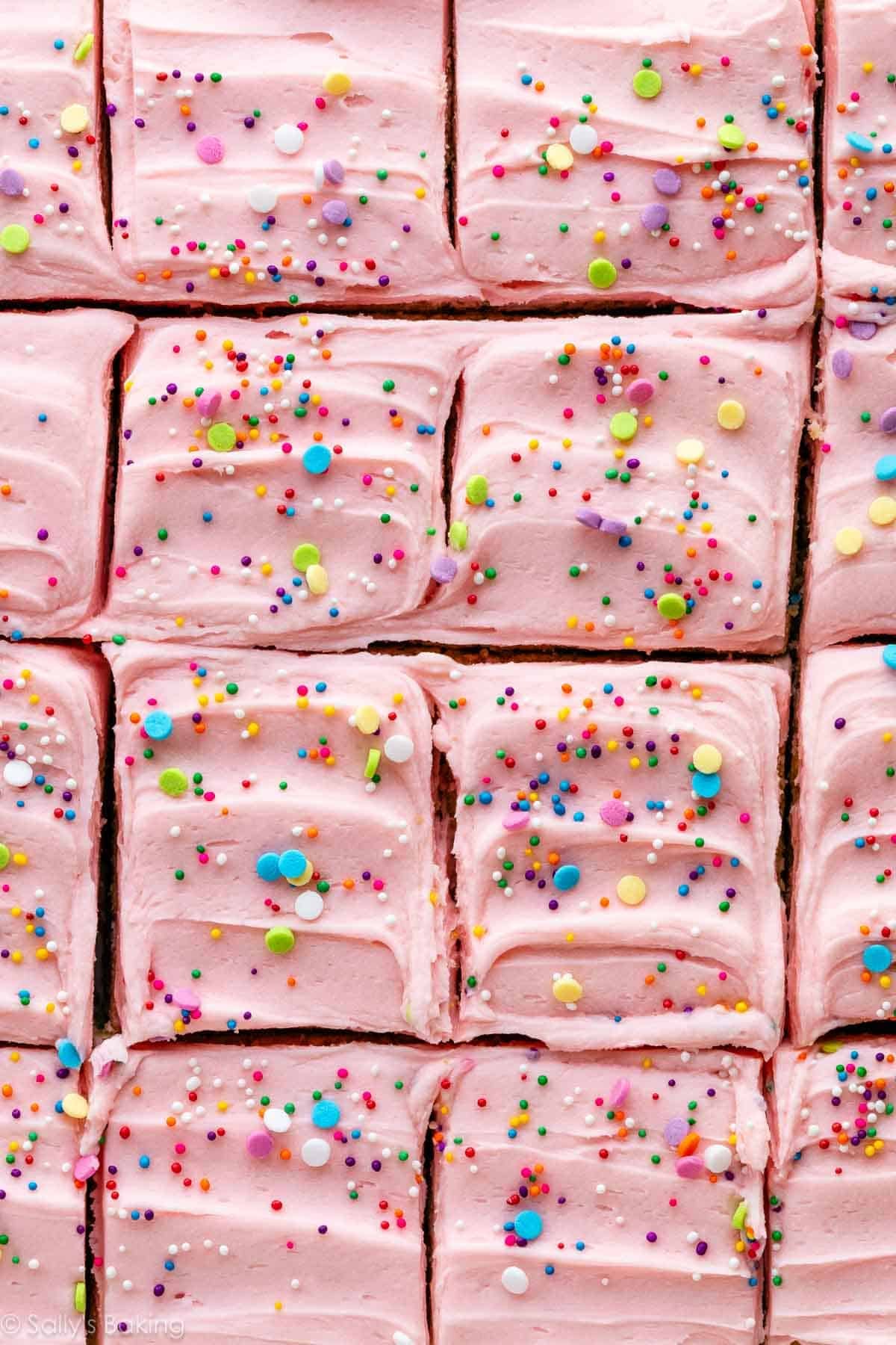 bars with pink frosting and rainbow sprinkles.
