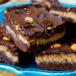 peanut butter stuffed brownies on a blue plate