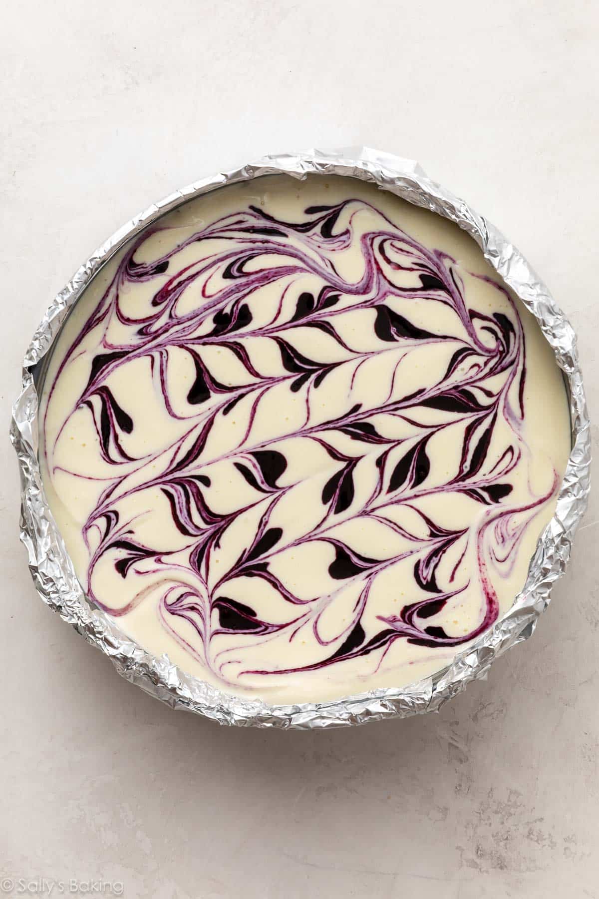 blueberry sauce swirled into top of cheesecake.