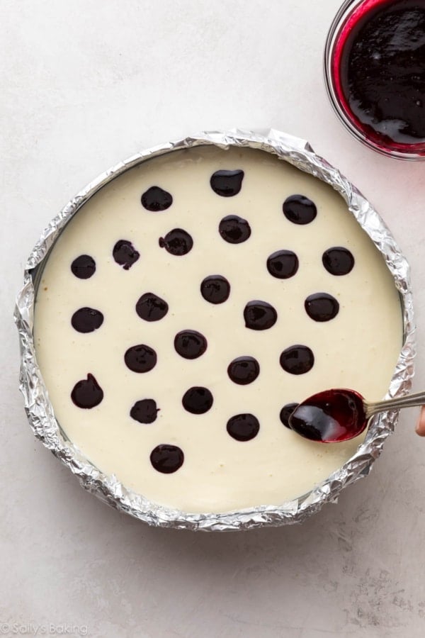 blueberry sauce dropped onto surface of batter.