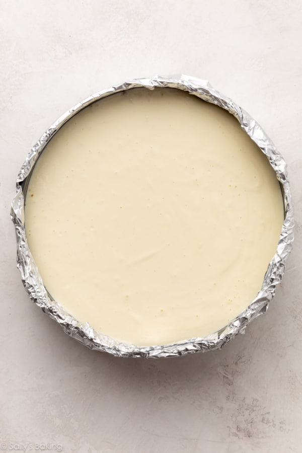 batter in aluminum foil-wrapped round pan.