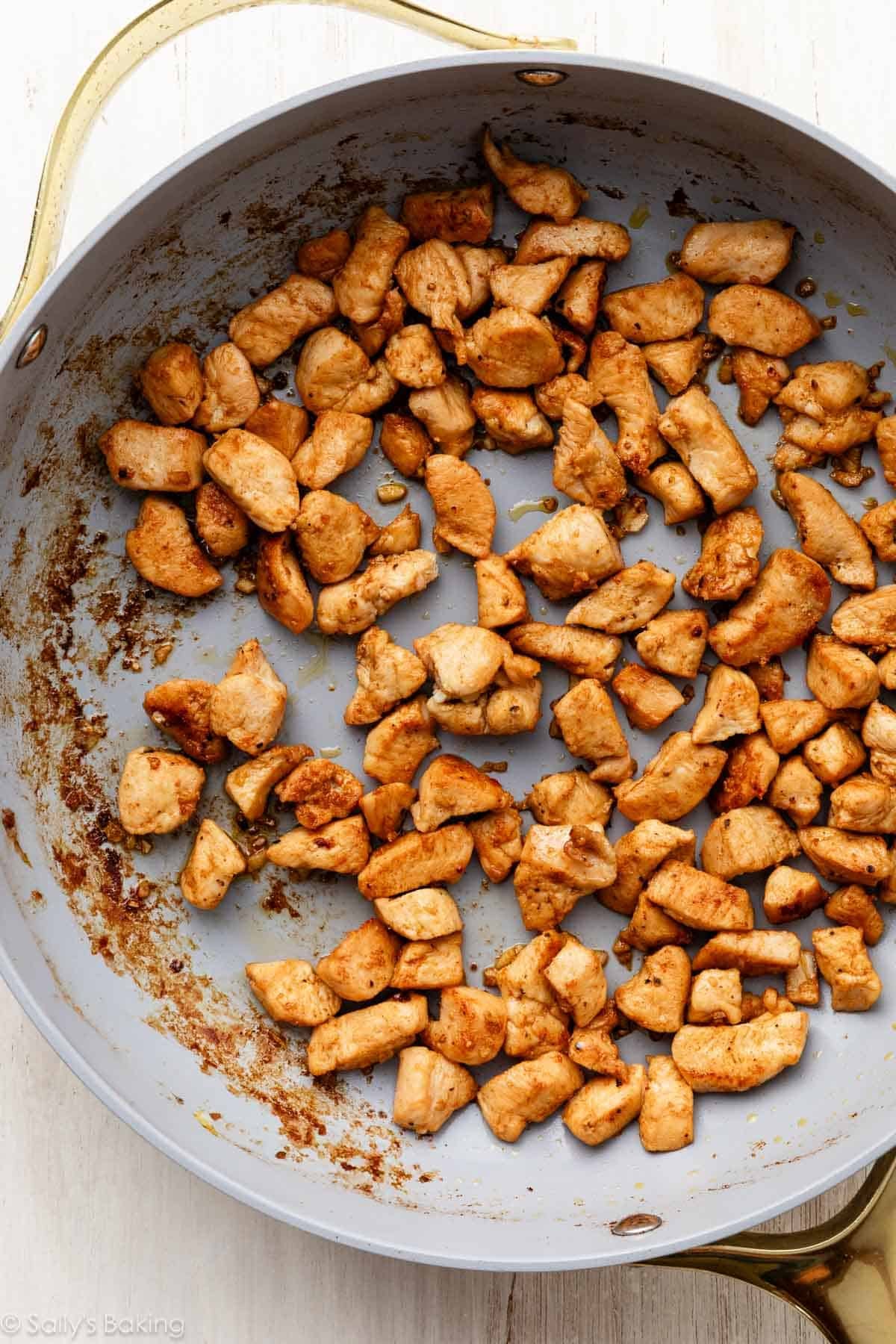 cooked chicken in pan.