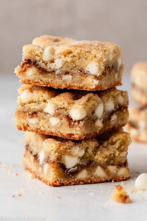 stack of 3 snickerdoodle blondies with white chocolate chips.