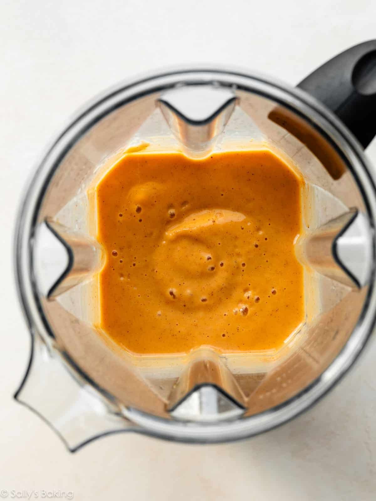 pumpkin smoothie mixture in blender.