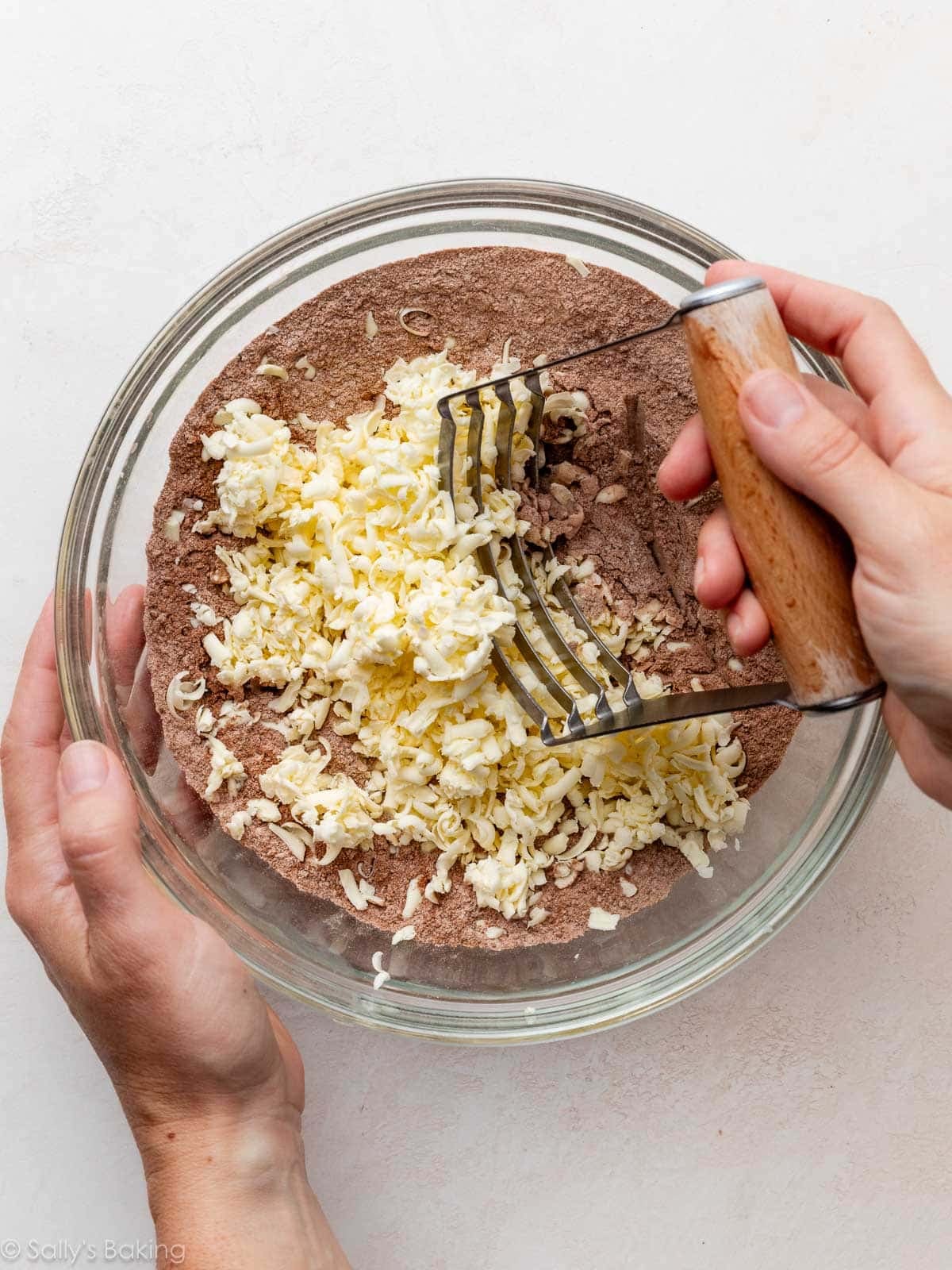 butter pieces on cocoa powder mixture.