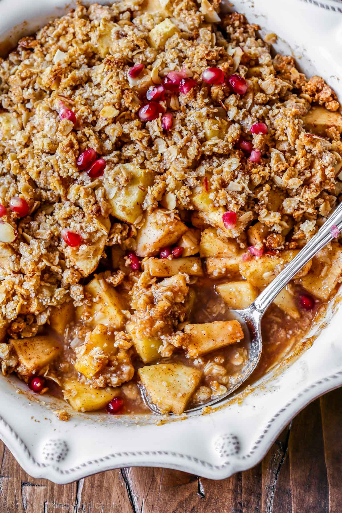 gluten free apple crisp with pomegranate arils on top
