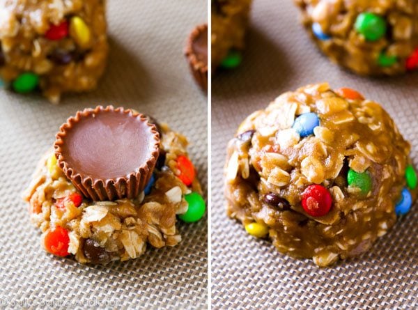 2 images of monster cookie dough with a peanut butter cup on top and monster cookie dough surrounding peanut butter cups on a silpat baking mat
