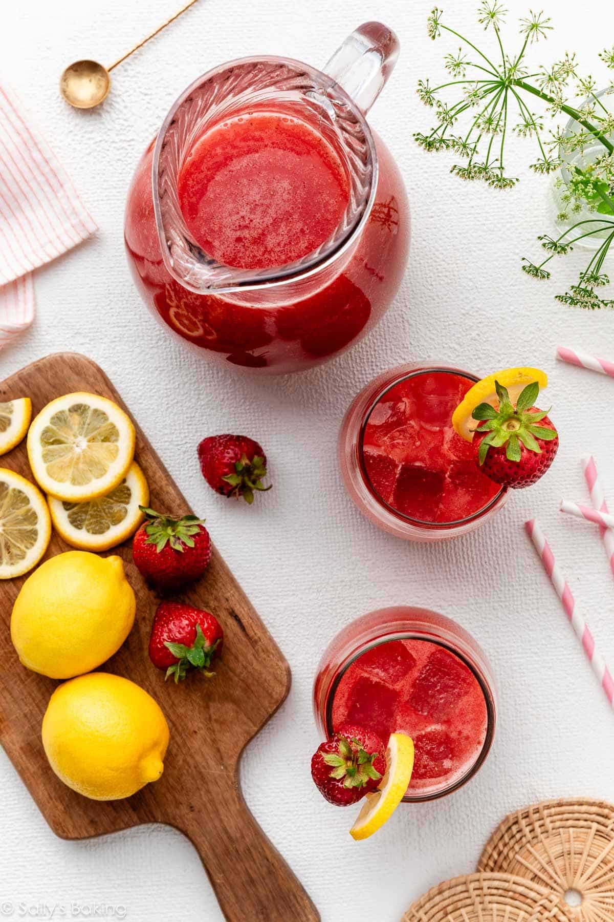 overhead photo of pitcher and glasses of homemade strawberry lemonade.
