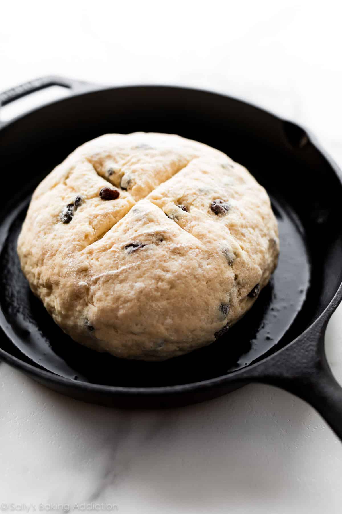 Irish soda bread dough in cast iron skillet before baking