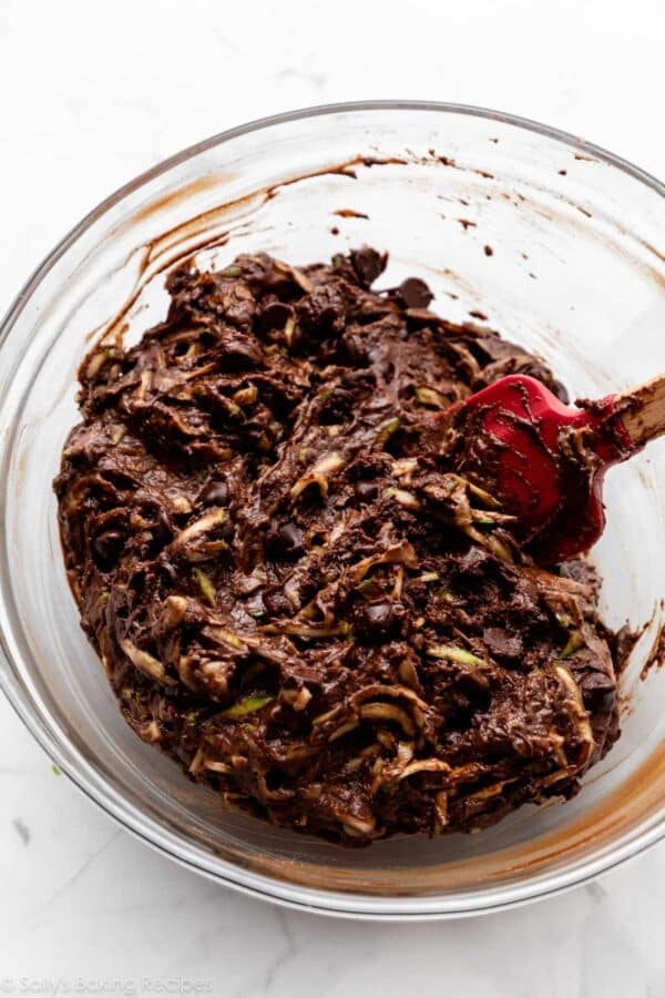 chocolate zucchini batter in glass bowl.