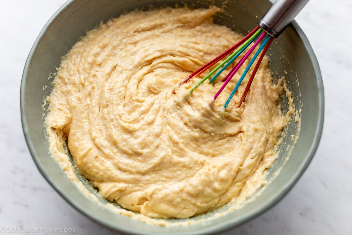 cornmeal batter in green bowl.
