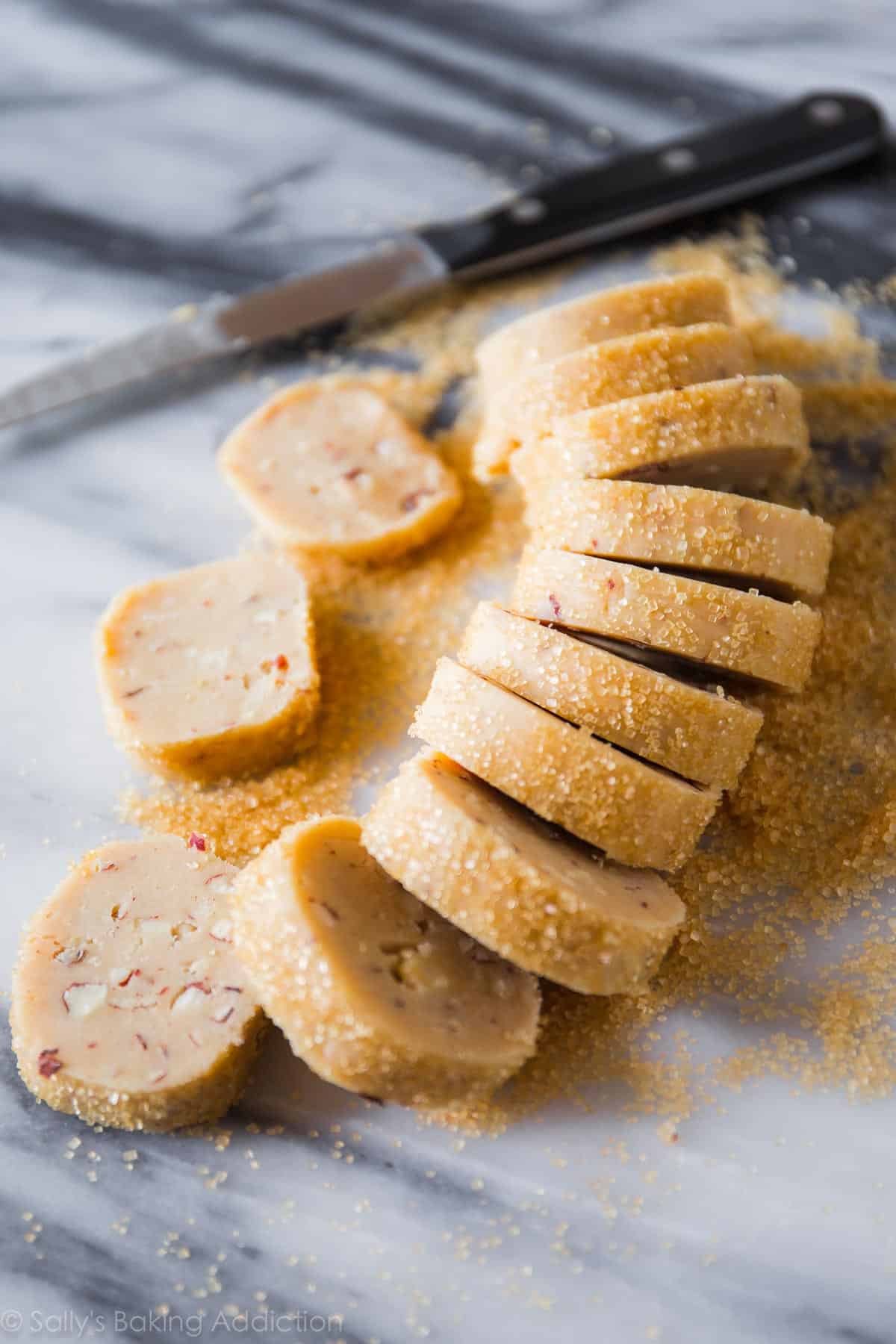 log of toasted hazelnut cookie dough cut into slices