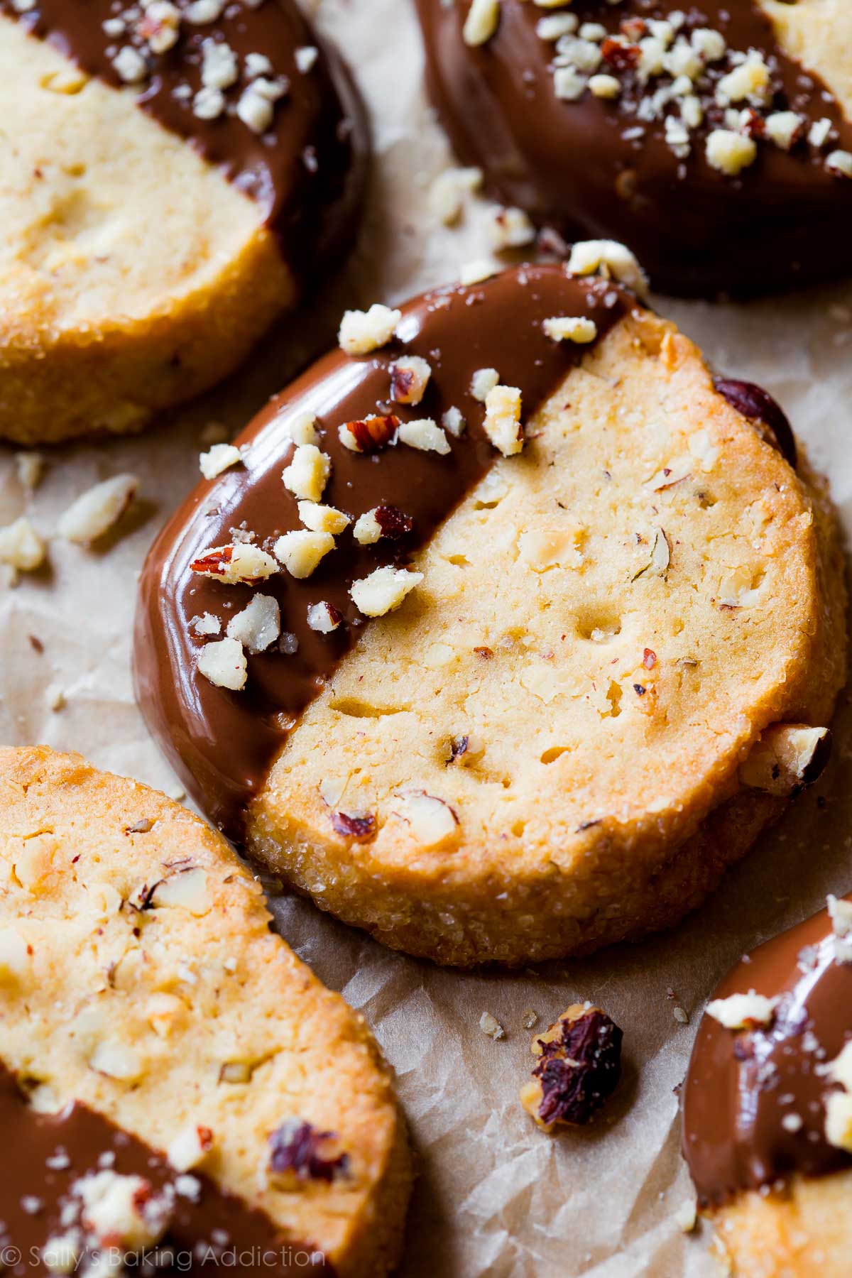 toasted hazelnut slice and bake cookies with half of each cookie dipped in milk chocolate
