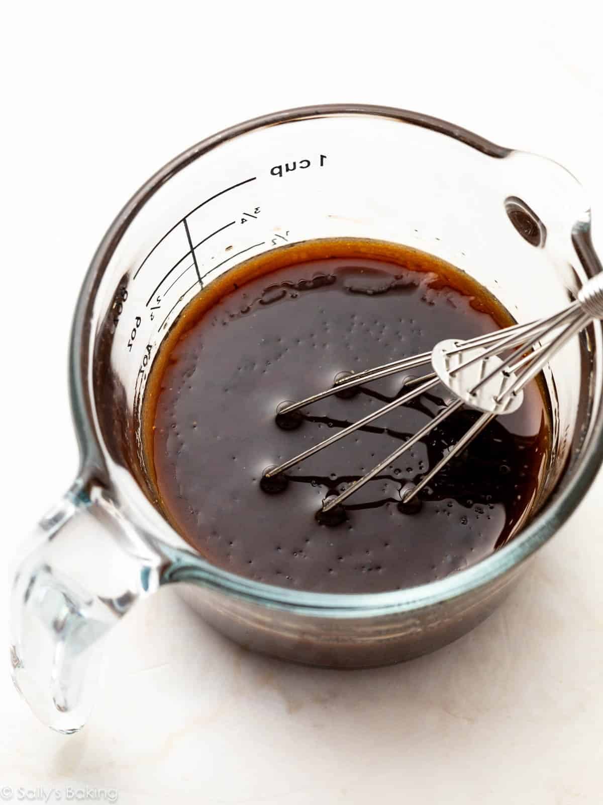 honey balsamic vinaigrette in liquid measuring cup.
