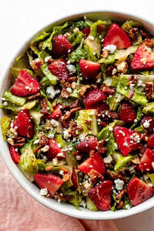 strawberry bacon salad with blue cheese and pecans.