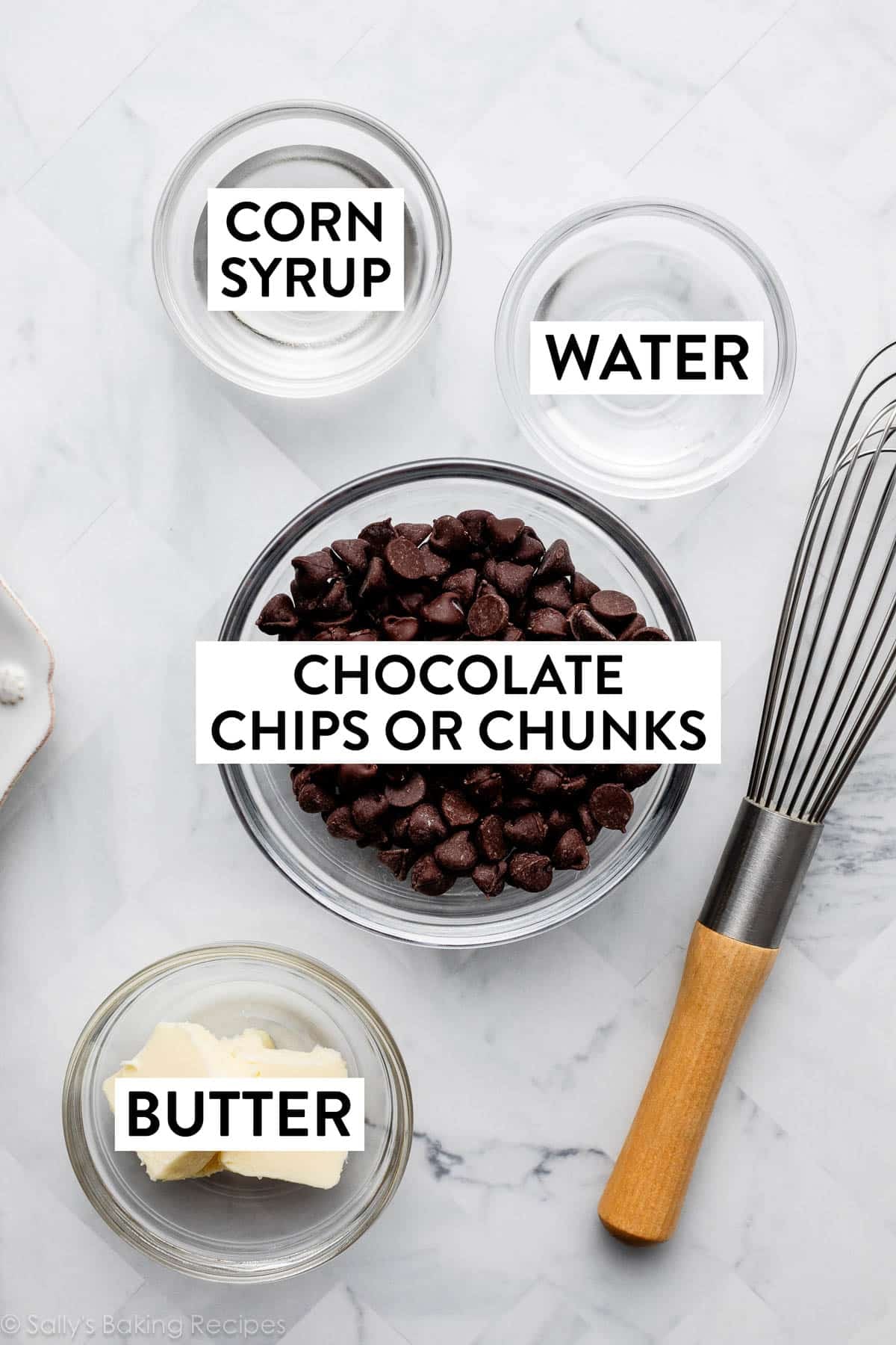 ingredients on counter including corn syrup, water, chocolate chips, and butter.