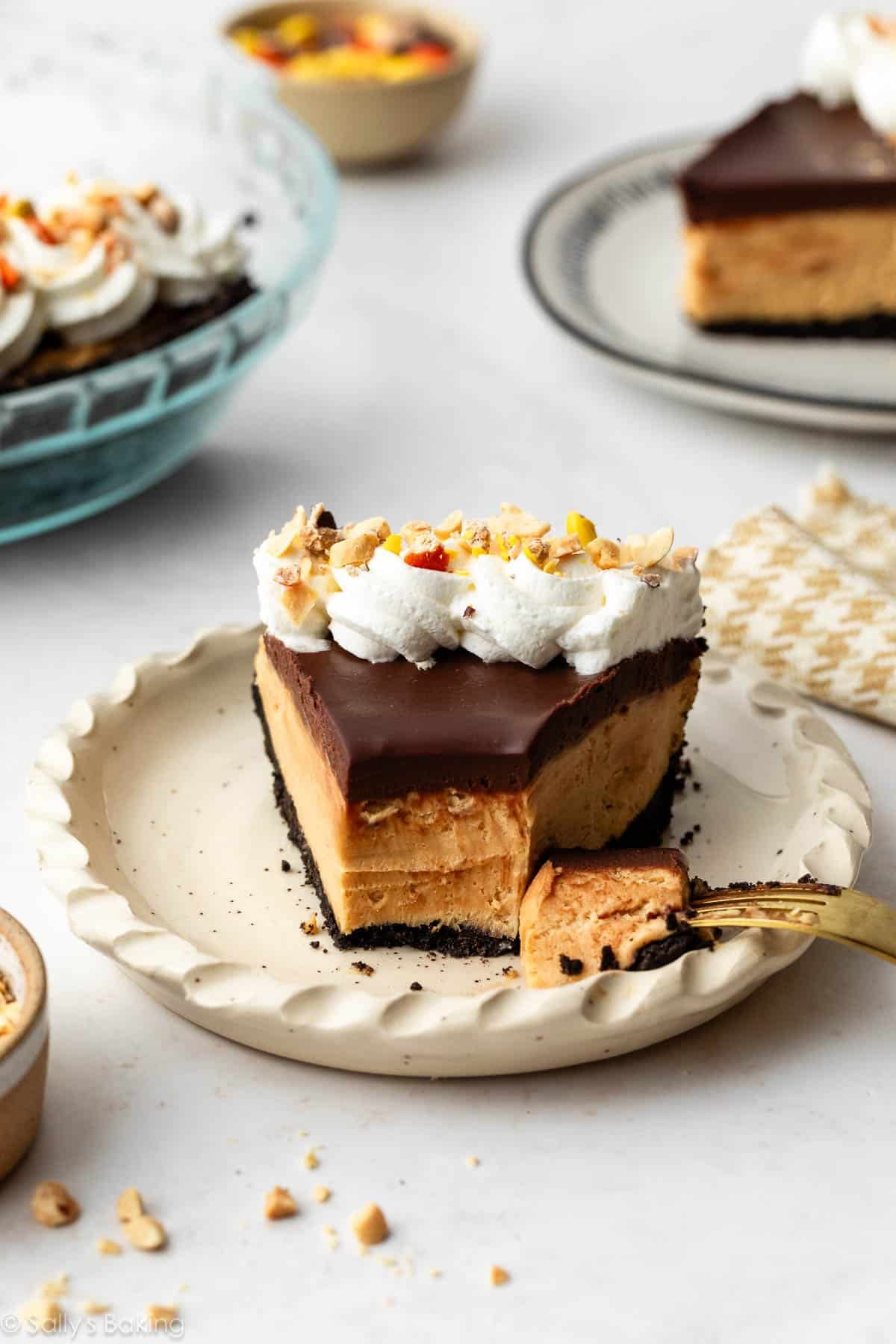 peanut butter pie slice with fork bite taken out.