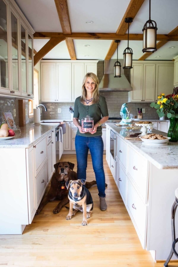 sally in the kitchen with dogs jude and franklin