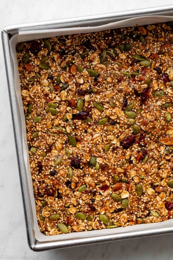 pepita, quinoa, oat mixture pressed into pan.