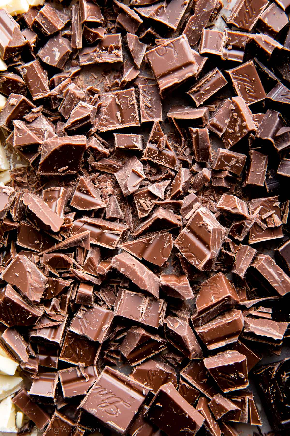 chopped chocolate chunks on cutting board