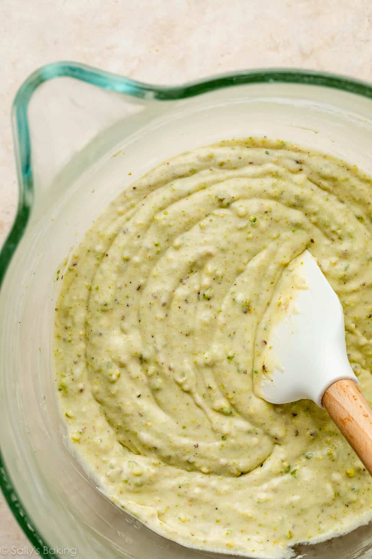 green cake batter in glass bowl.