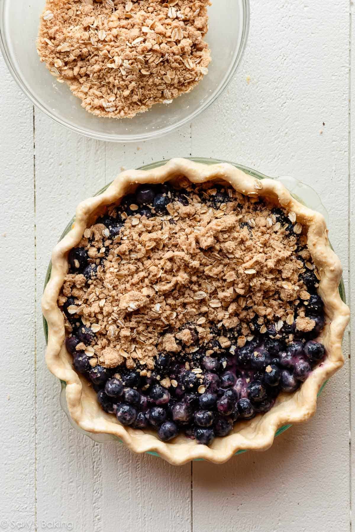 unbaked blueberry pie with crumble topping.