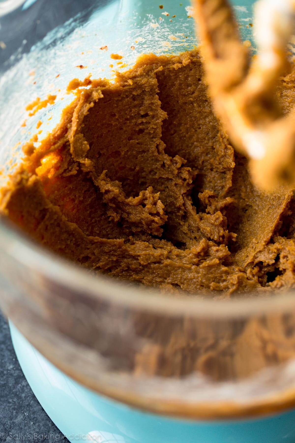 molasses cookie dough in a glass bowl