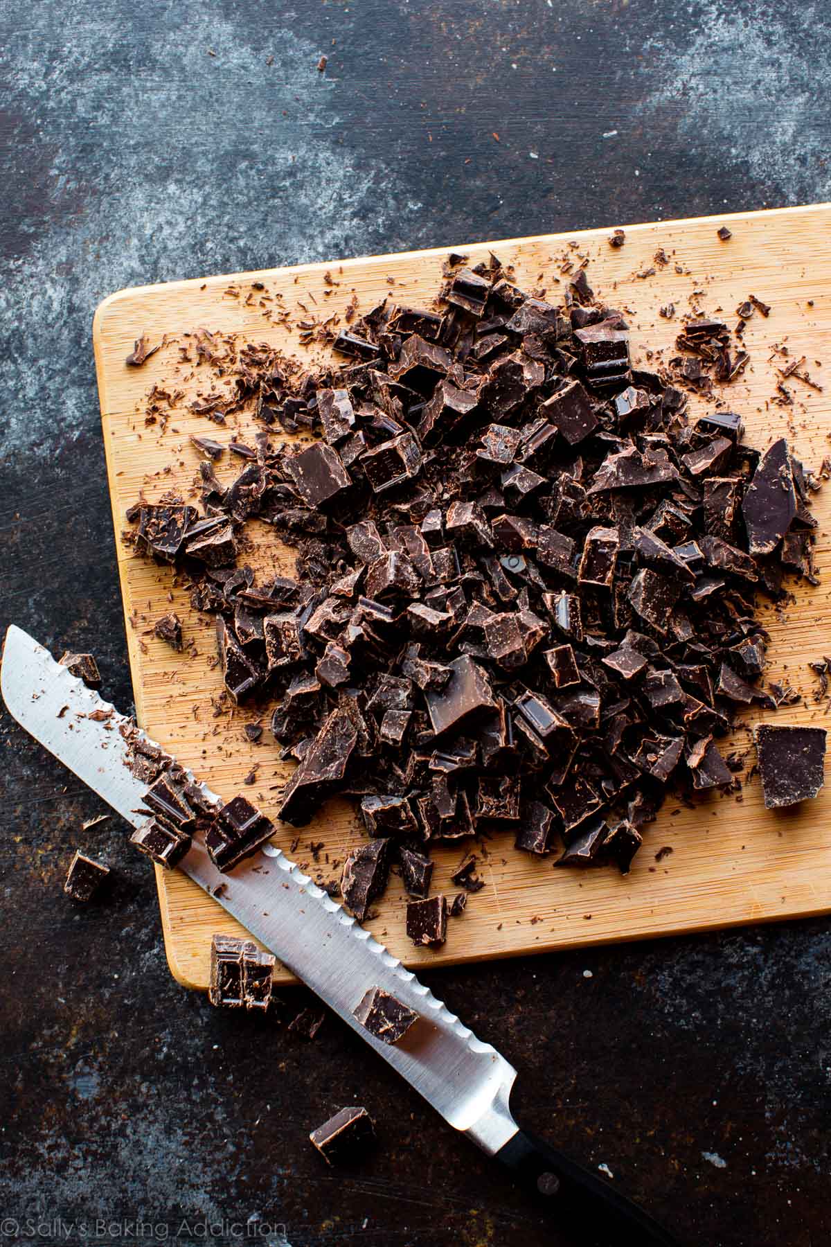 chopped chocolate on a wood cutting board