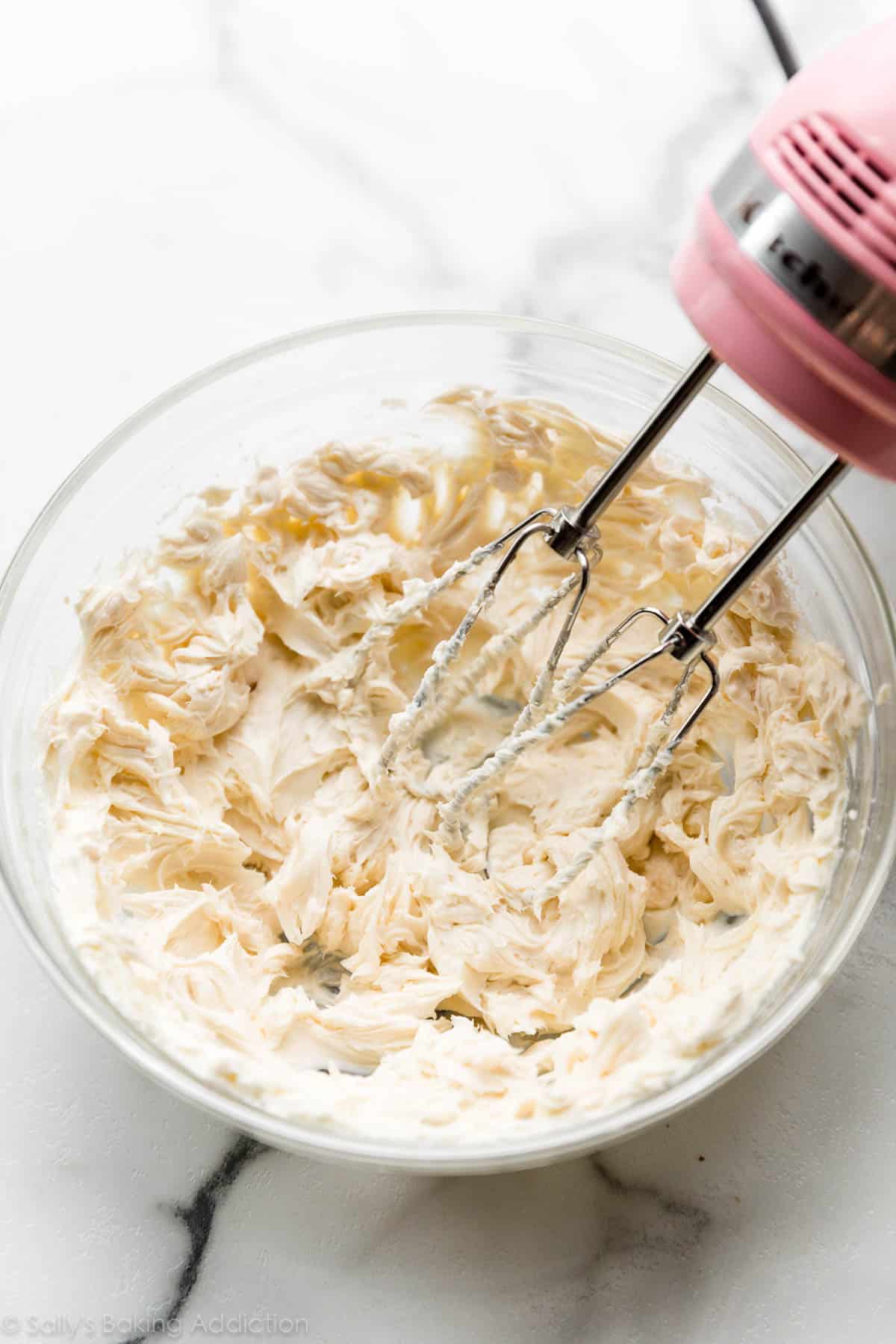cream cheese and confectioners' sugar mixture in glass bowl