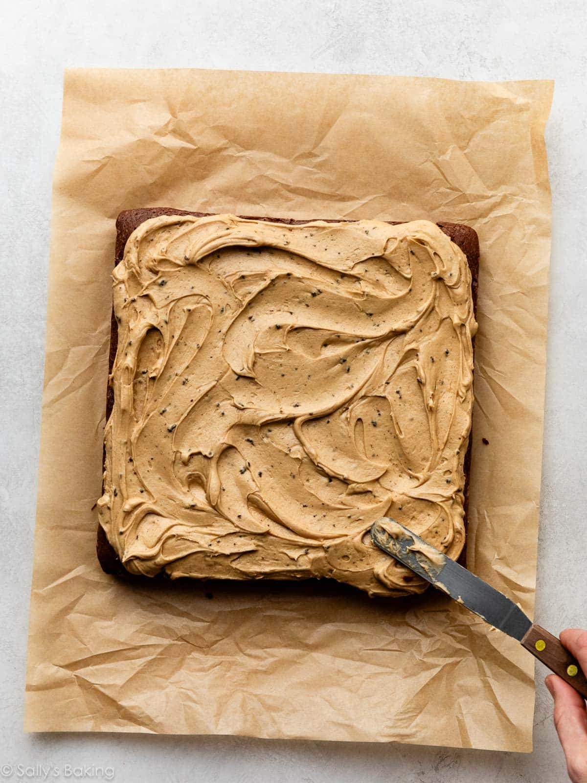 brown espresso frosting on brownies.