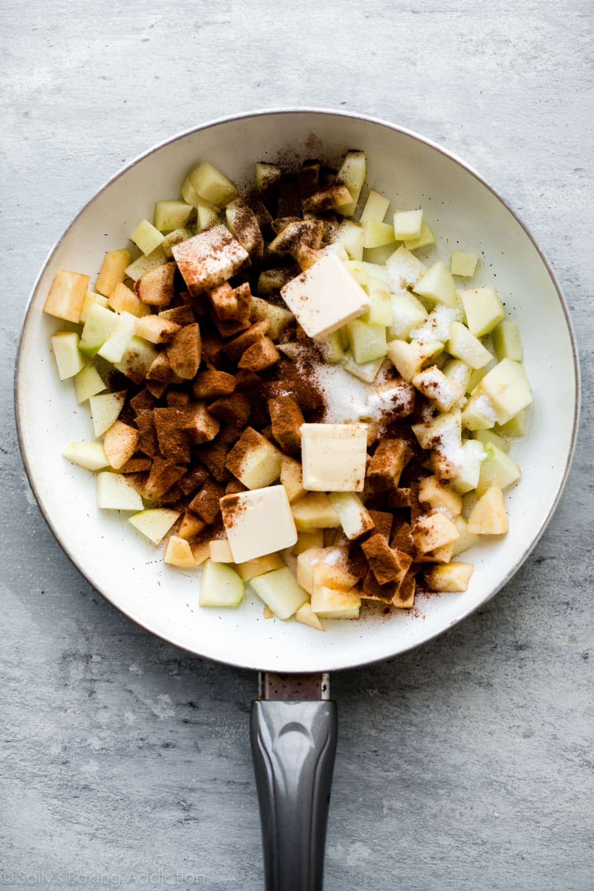 apple pie filling ingredients in a skillet