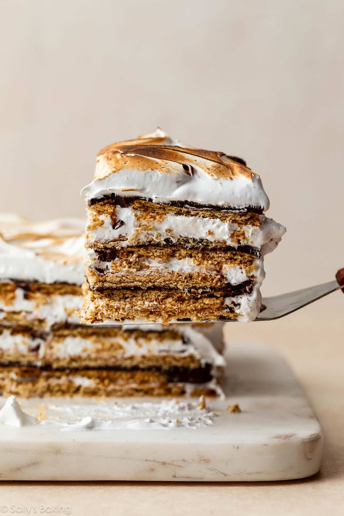 slice of no bake s'mores icebox cake on spatula.