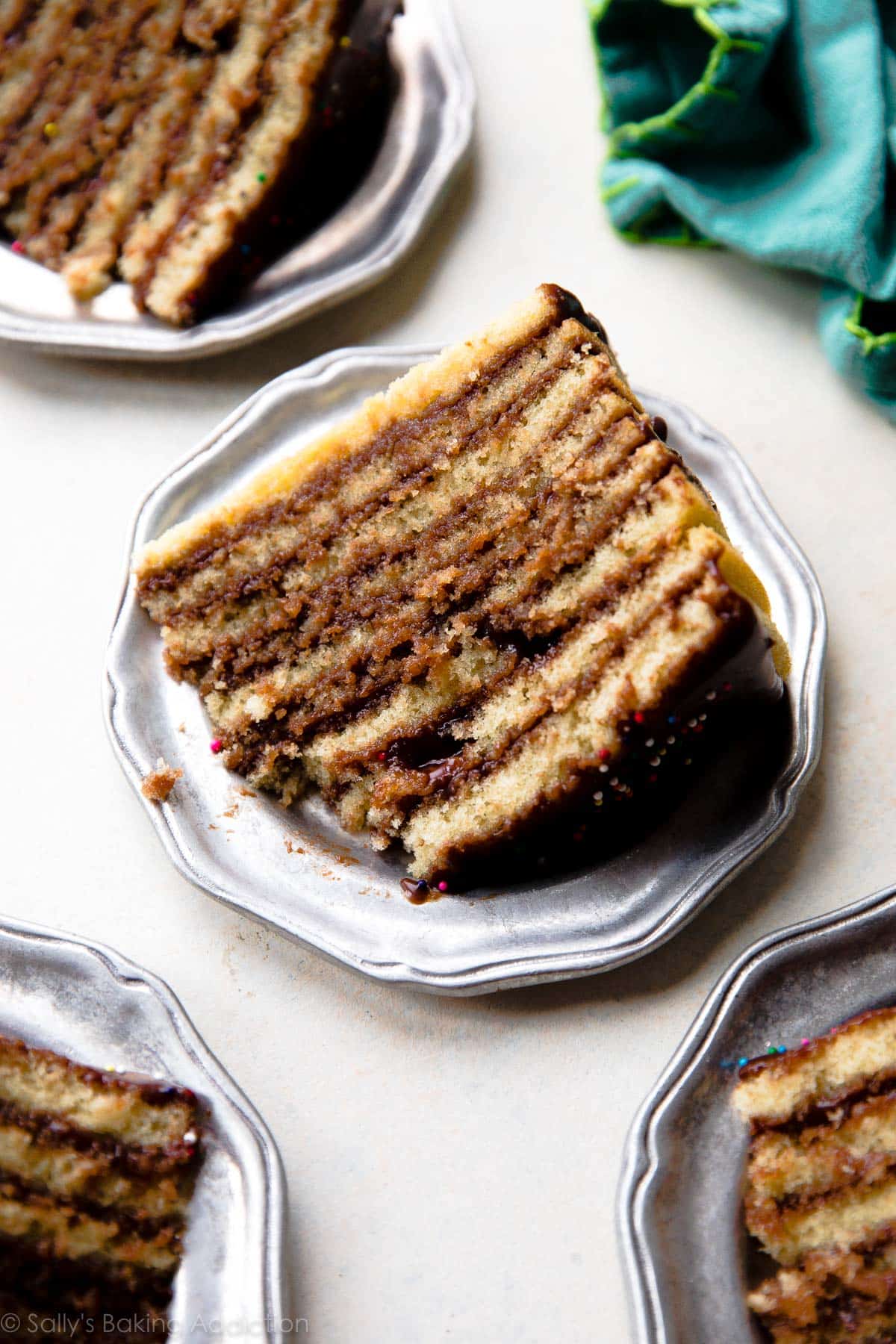 slices of Smith Island Cake on silver plates