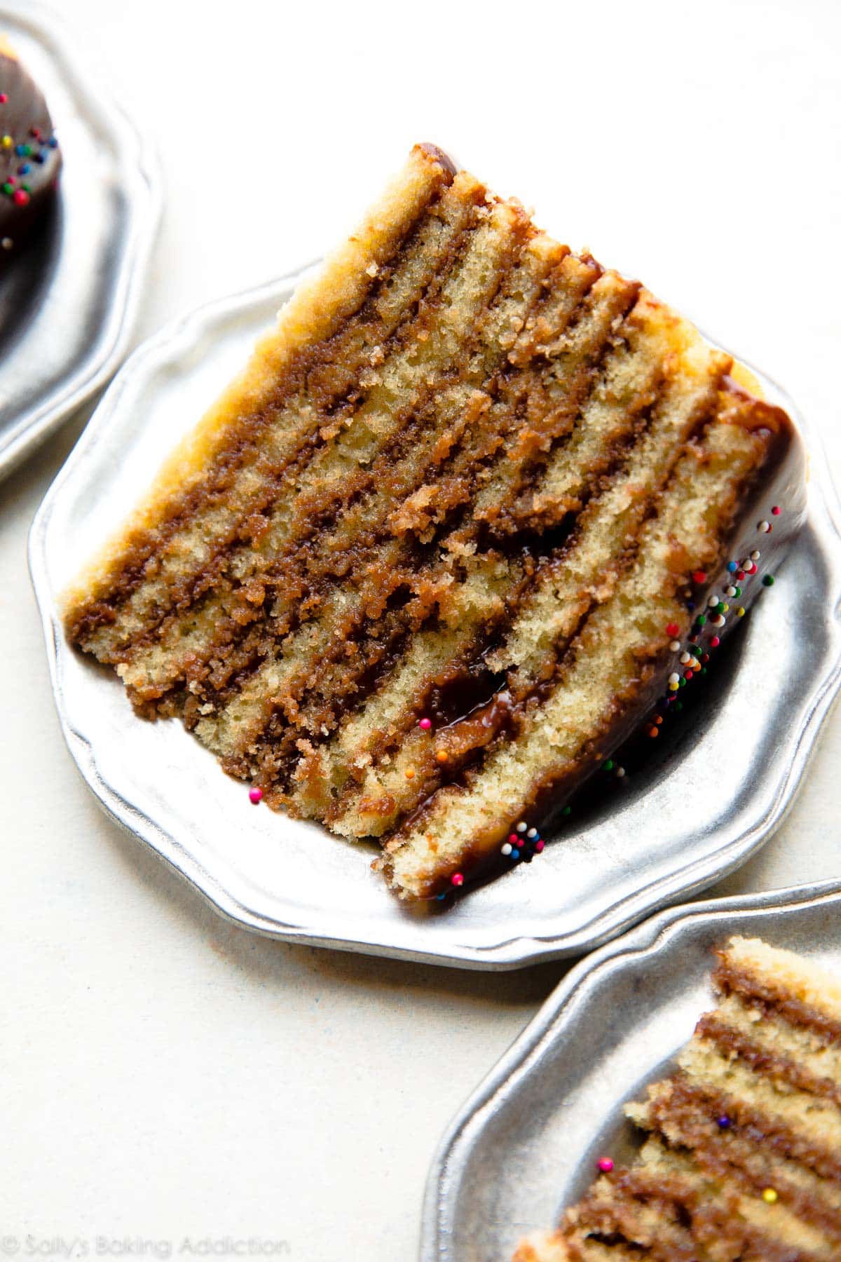 slices of Smith Island Cake on silver plates
