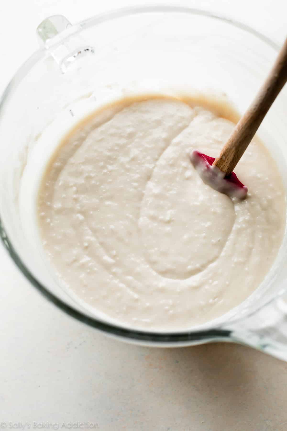 Coconut cake batter in glass bowl